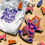 Jogo de tabuleiro The Crazy Cat Lady Game Fig. 6: Boneca Crazy Cat