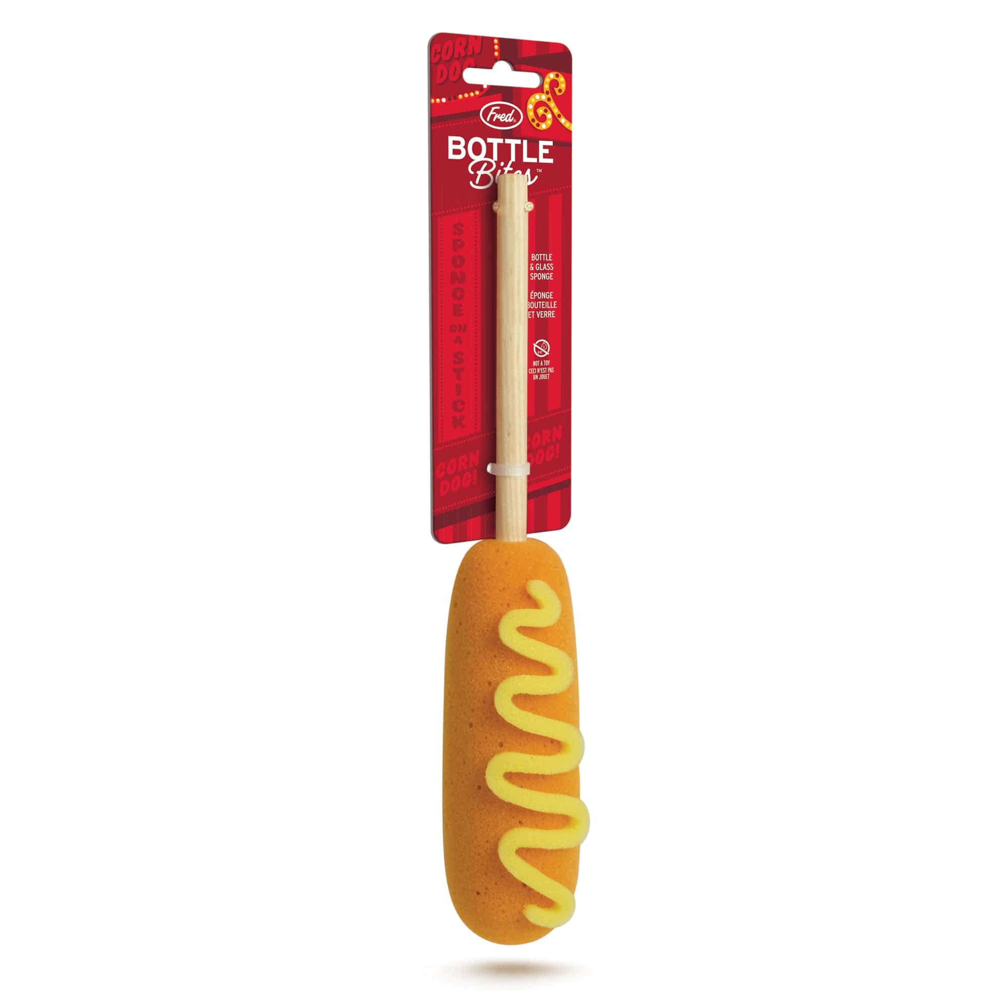 A bottle brush that looks like a corn dog with mustard on packaging