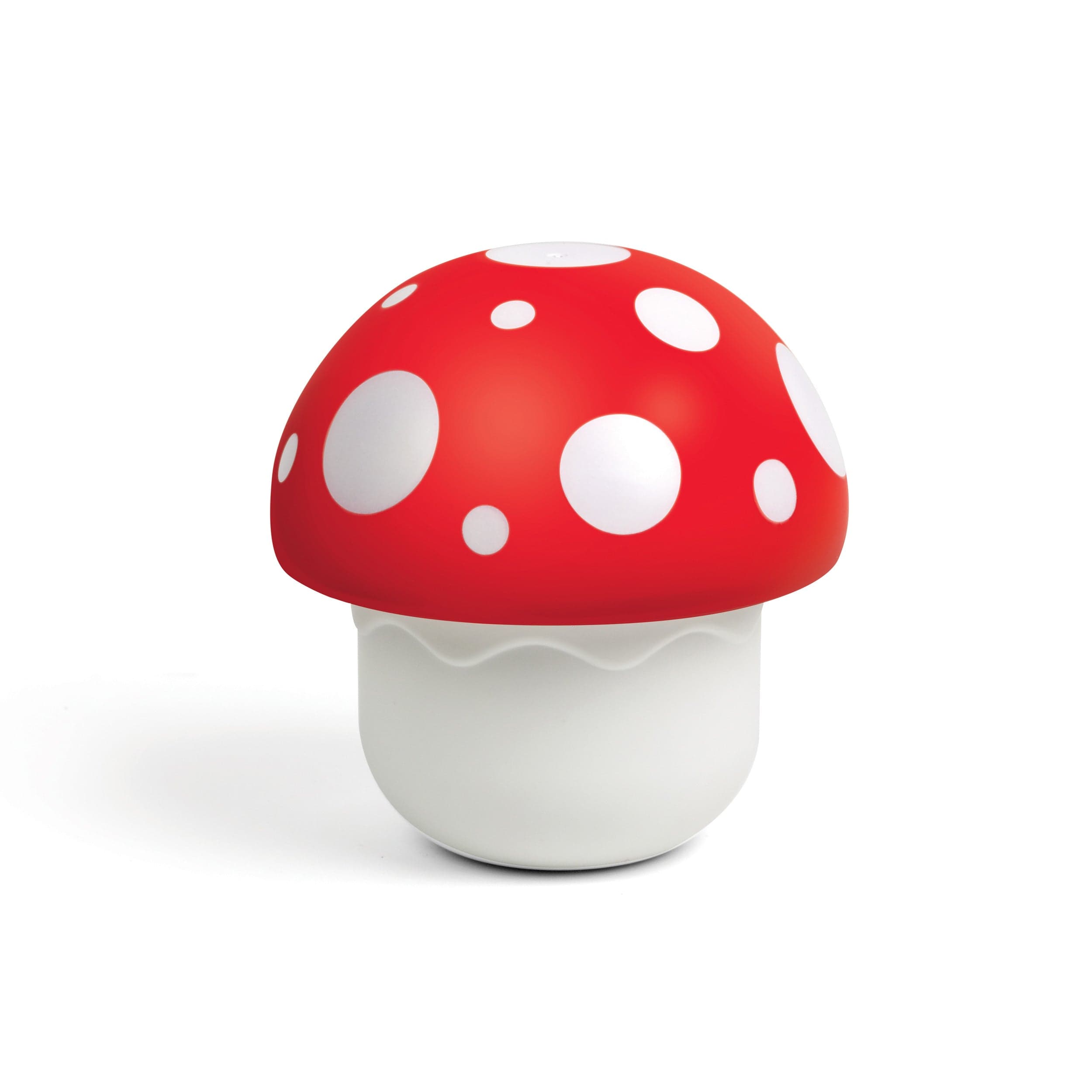 A plastic mushroom with a red top and polka dots