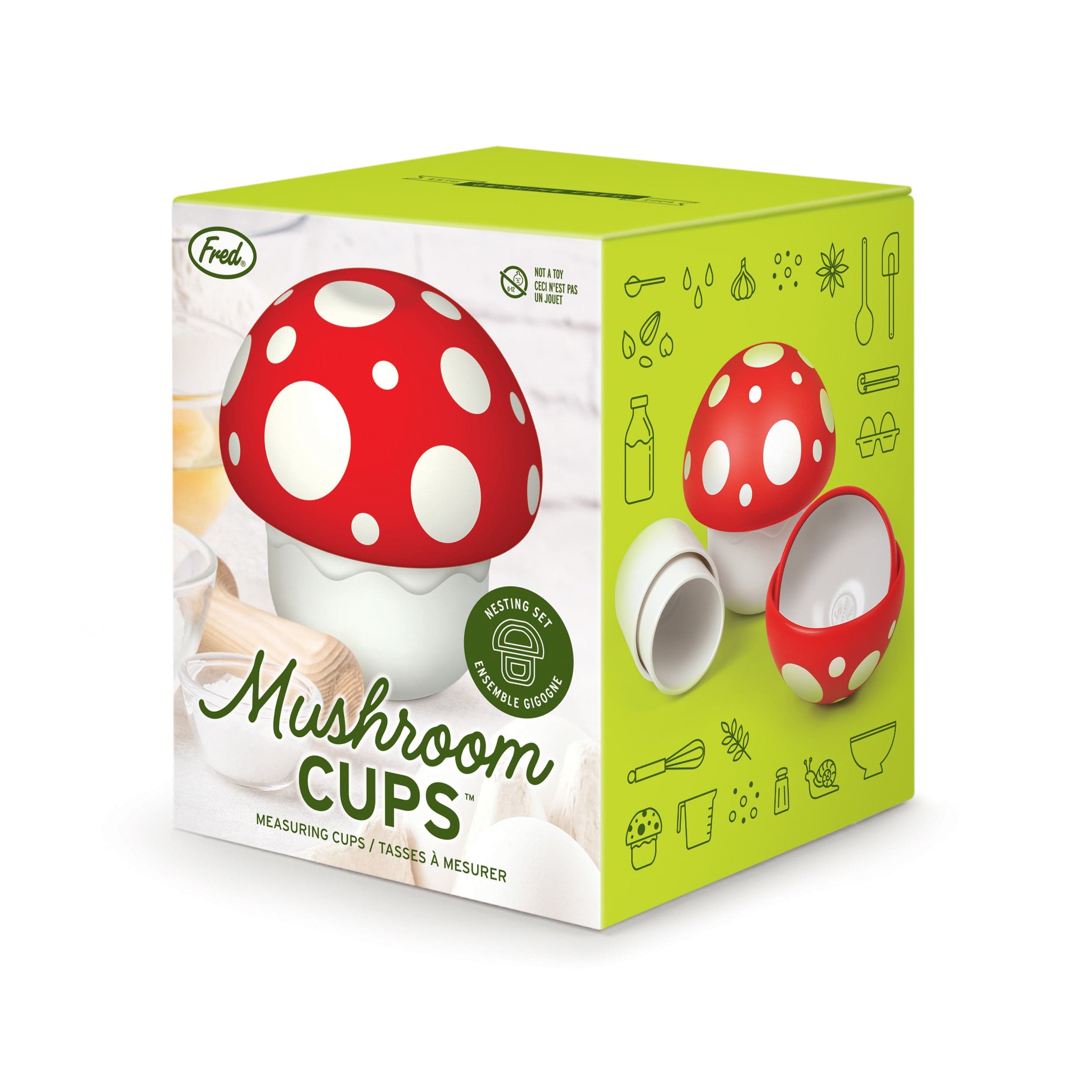 A set of nesting measuring cups that look like mushrooms. Fred Mushroom Cups - Nesting Set