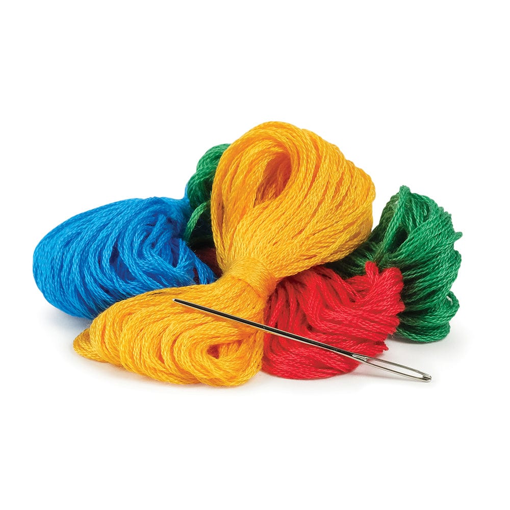 Four colors of embroidery thread and a needle are included in the kit.